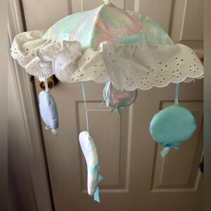 vintage pastel baby mobile and crib sheet green pink blue yellow